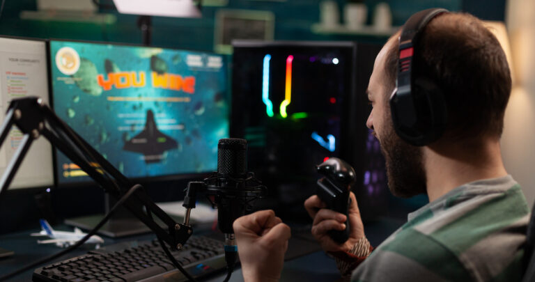 Videogaming: image of gamer in from of a computer screen