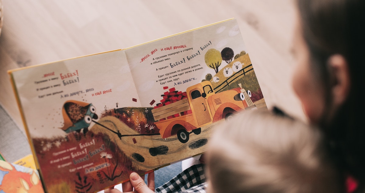 woman-reading-book-to-toddler-1741231