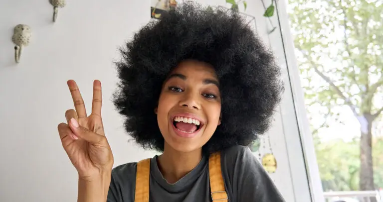 Webcam view of influencer beauty blogger speaking online with followers